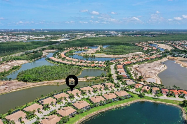 10016 Majestic Ave, Fort Myers, FL 33913 - aerial view of property and surrounding area with a large body of water and nearby suburban area