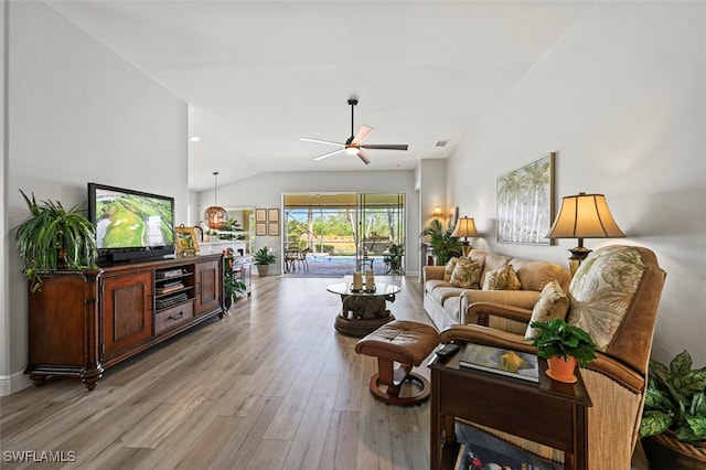 10016 Majestic Ave, Fort Myers, FL 33913 - living room with light wood-style floors, a ceiling fan, and lofted ceiling