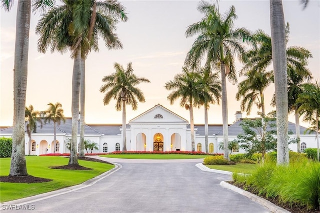 591 Audubon Blvd Unit B202, Naples, FL 34110 - view of property featuring curved driveway