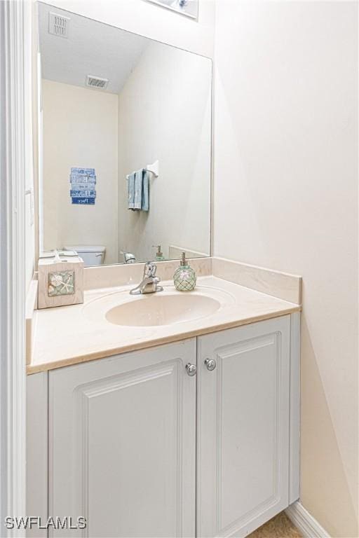 1373 Weeping Willow Ct, Cape Coral, FL 33909 - half bath featuring vanity and toilet