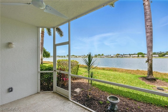 3460 W Crown Pointe Blvd Unit 101, Naples, FL 34112 - unfurnished sunroom with a water view and a ceiling fan