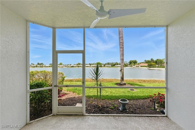 3460 W Crown Pointe Blvd Unit 101, Naples, FL 34112 - unfurnished sunroom with a water view and ceiling fan