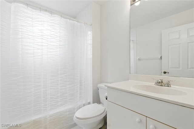 3460 W Crown Pointe Blvd Unit 101, Naples, FL 34112 - bathroom with toilet, vanity, and shower / tub combo with curtain