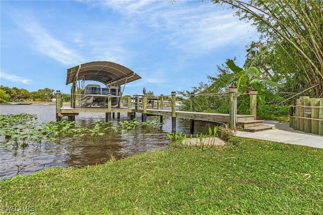 110 Hampton Ave, Labelle, FL 33935 - dock featuring a water view and a lawn