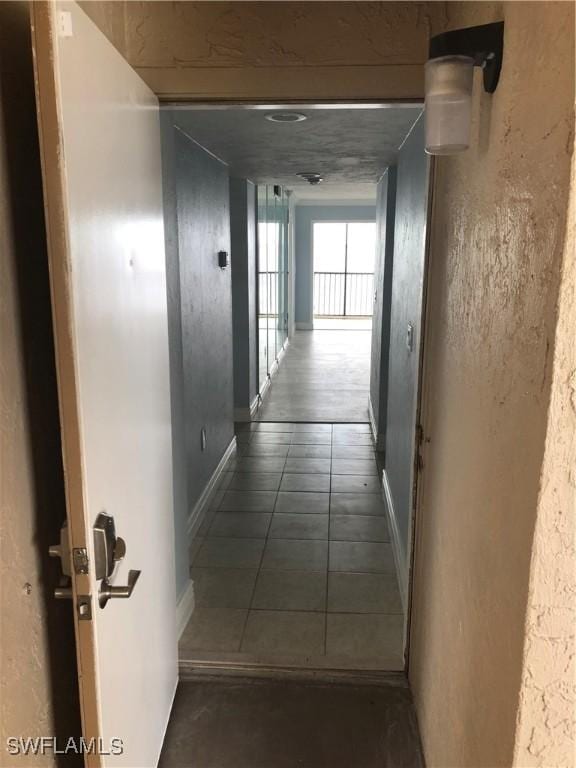 4510 N Key Dr Unit 302, North Fort Myers, FL 33903 - hall featuring baseboards