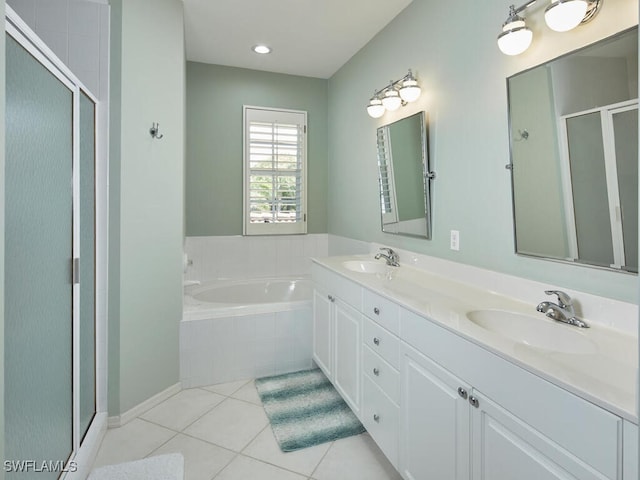 26986 Montego Pointe Ct Unit 202, Bonita Springs, FL 34134 - full bathroom with tile patterned floors, a stall shower, double vanity, and a garden tub