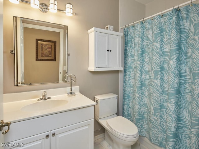 26986 Montego Pointe Ct Unit 202, Bonita Springs, FL 34134 - bathroom featuring vanity, toilet, and a shower with shower curtain