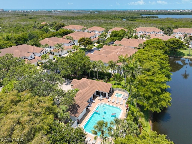 26986 Montego Pointe Ct Unit 202, Bonita Springs, FL 34134 - aerial overview of property's location featuring a pool, nearby suburban area, and a large body of water