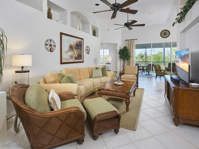 26986 Montego Pointe Ct Unit 202, Bonita Springs, FL 34134 - living room featuring ceiling fan, a high ceiling, and light tile patterned floors