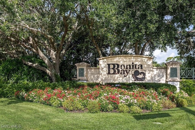 26986 Montego Pointe Ct Unit 202, Bonita Springs, FL 34134 - community sign with a lawn