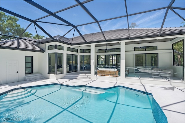 24721 Bay Bean Ct, Bonita Springs, FL 34134 - swimming pool featuring a patio, an outdoor living space, and a lanai
