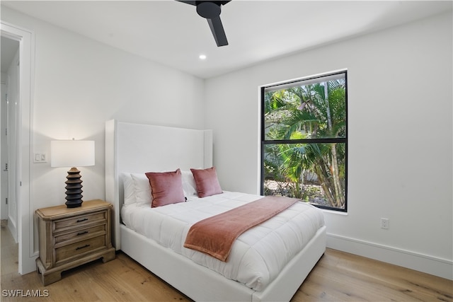 24721 Bay Bean Ct, Bonita Springs, FL 34134 - bedroom featuring light wood finished floors, baseboards, recessed lighting, and a ceiling fan