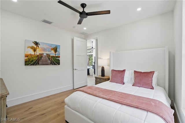 24721 Bay Bean Ct, Bonita Springs, FL 34134 - bedroom with light wood finished floors, recessed lighting, baseboards, and ceiling fan