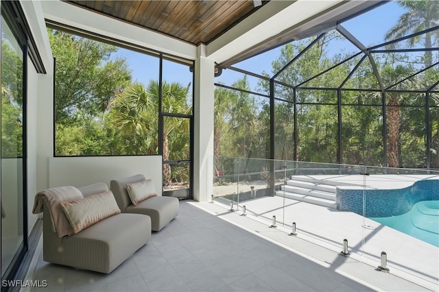 24721 Bay Bean Ct, Bonita Springs, FL 34134 - sunroom / solarium featuring plenty of natural light