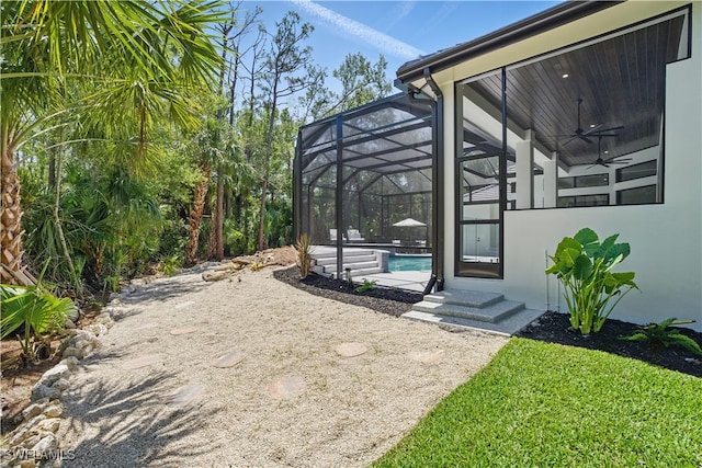 24721 Bay Bean Ct, Bonita Springs, FL 34134 - view of patio featuring a ceiling fan, an outdoor pool, and a lanai