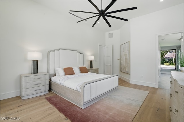24721 Bay Bean Ct, Bonita Springs, FL 34134 - bedroom with light wood-style floors, baseboards, a towering ceiling, recessed lighting, and ceiling fan