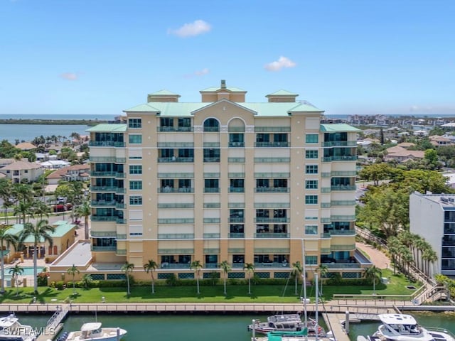 1079 Bald Eagle Dr Unit N604, Marco Island, FL 34145 - view of apartment building / complex featuring a water view