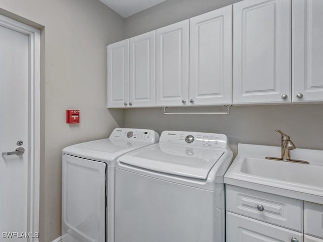 1079 Bald Eagle Dr Unit N604, Marco Island, FL 34145 - laundry area with cabinet space and washer and clothes dryer