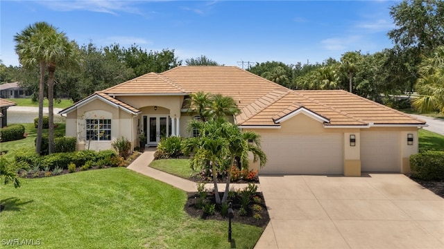 12501 Walden Run Dr, Fort Myers, FL 33913 - mediterranean / spanish-style house with an attached garage, a tiled roof, a front yard, concrete driveway, and french doors