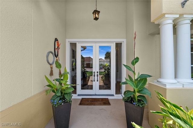 12501 Walden Run Dr, Fort Myers, FL 33913 - doorway to property featuring french doors and stucco siding