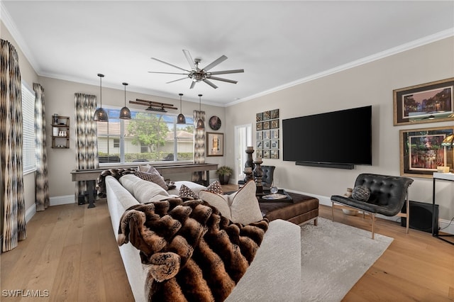 12501 Walden Run Dr, Fort Myers, FL 33913 - living room featuring a ceiling fan, light wood-style flooring, baseboards, and crown molding