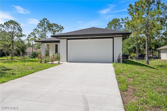 2917 50th St W, Lehigh Acres, FL 33971 - view of front of house featuring concrete driveway, a front lawn, stucco siding, and a garage