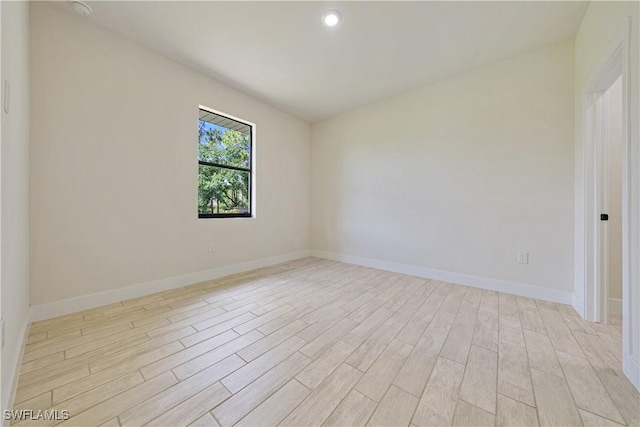 2917 50th St W, Lehigh Acres, FL 33971 - empty room featuring light wood-style flooring and baseboards