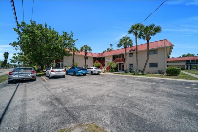 198 Joel Blvd Unit 5, Lehigh Acres, FL 33936 - view of property with uncovered parking