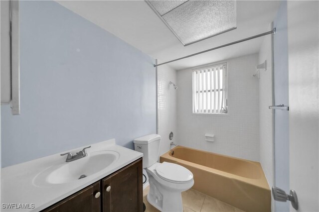 198 Joel Blvd Unit 5, Lehigh Acres, FL 33936 - full bath featuring shower / bath combination, toilet, tile patterned floors, and vanity