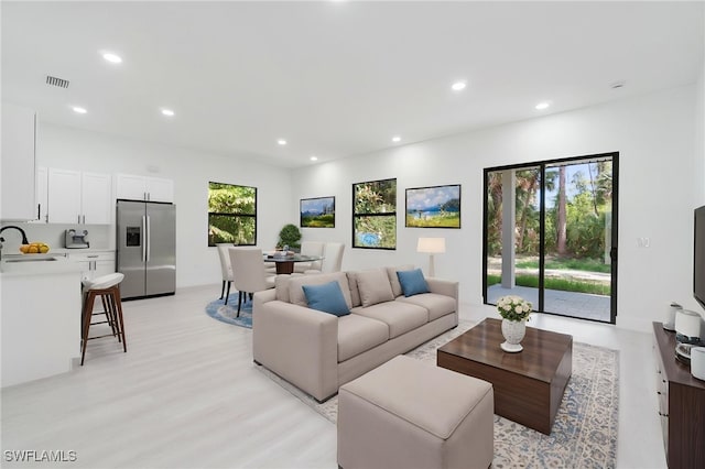 5015 Placid Ln, Labelle, FL 33935 - living room with recessed lighting and light wood finished floors