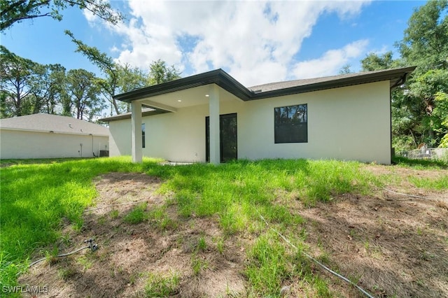 5015 Placid Ln, Labelle, FL 33935 - back of property with stucco siding