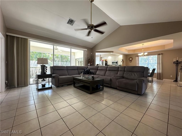 4219 Tequesta Dr, Estero, FL 33928 - living area with light tile patterned flooring, a chandelier, ceiling fan, and lofted ceiling