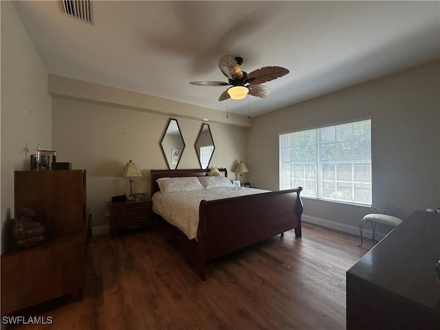 4219 Tequesta Dr, Estero, FL 33928 - bedroom featuring wood finished floors, baseboards, and a ceiling fan