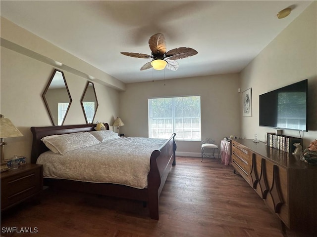 4219 Tequesta Dr, Estero, FL 33928 - bedroom featuring dark wood-style floors, ceiling fan, and baseboards