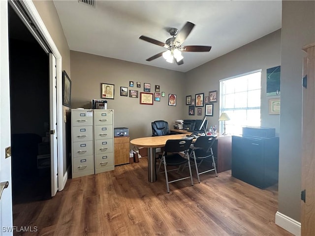 4219 Tequesta Dr, Estero, FL 33928 - office area featuring ceiling fan and wood finished floors