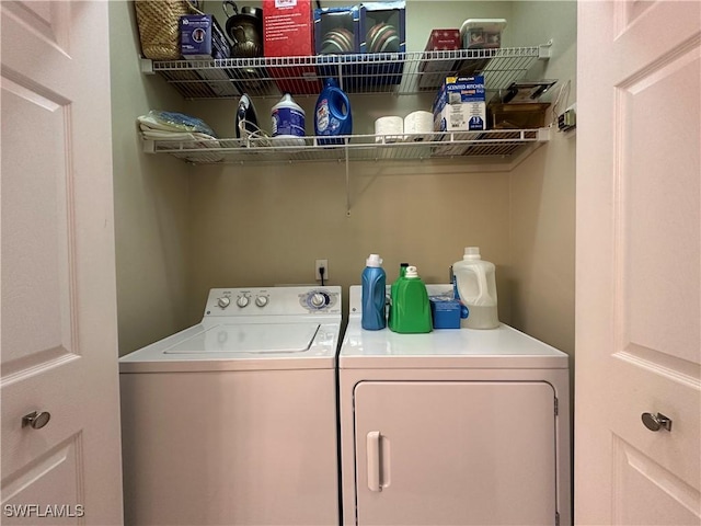 4219 Tequesta Dr, Estero, FL 33928 - laundry area with separate washer and dryer