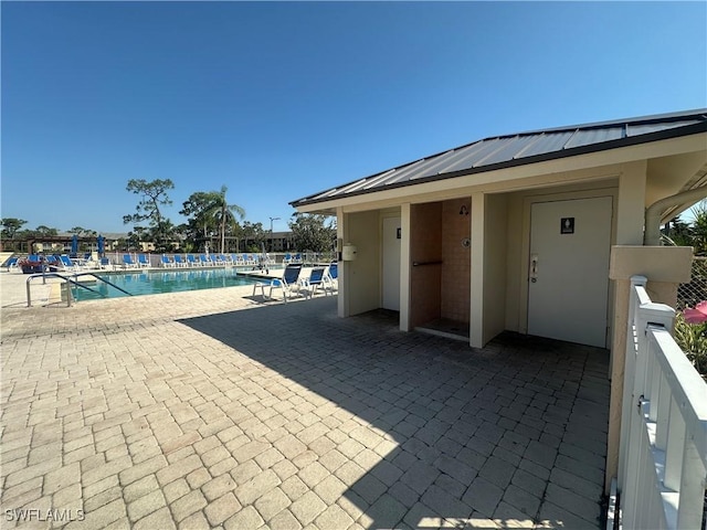 4219 Tequesta Dr, Estero, FL 33928 - community pool featuring a patio