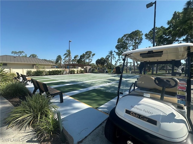 4219 Tequesta Dr, Estero, FL 33928 - view of community with shuffleboard