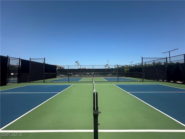 4219 Tequesta Dr, Estero, FL 33928 - view of tennis court featuring community basketball court