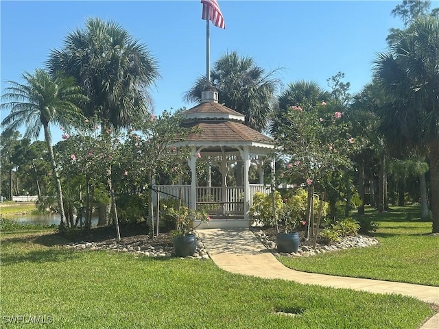 4219 Tequesta Dr, Estero, FL 33928 - view of property's community featuring a gazebo, a yard, and a water view