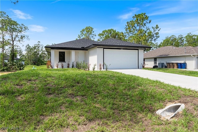 2907 55th St W, Lehigh Acres, FL 33971 - view of front facade featuring concrete driveway, a garage, stucco siding, and a front yard