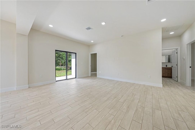 2907 55th St W, Lehigh Acres, FL 33971 - unfurnished room with light wood-type flooring and recessed lighting
