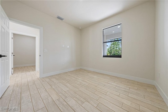 2907 55th St W, Lehigh Acres, FL 33971 - unfurnished room featuring light wood-style floors