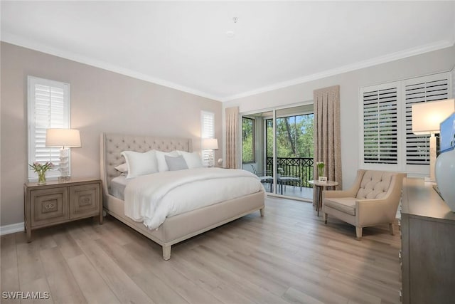 2839 Tiburon Blvd E Unit 102, Naples, FL 34109 - bedroom featuring access to outside, light wood-style floors, crown molding, and baseboards
