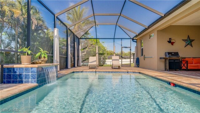 2541 SW 32nd Ln, Cape Coral, FL 33914 - outdoor pool featuring area for grilling, a lanai, and a patio area