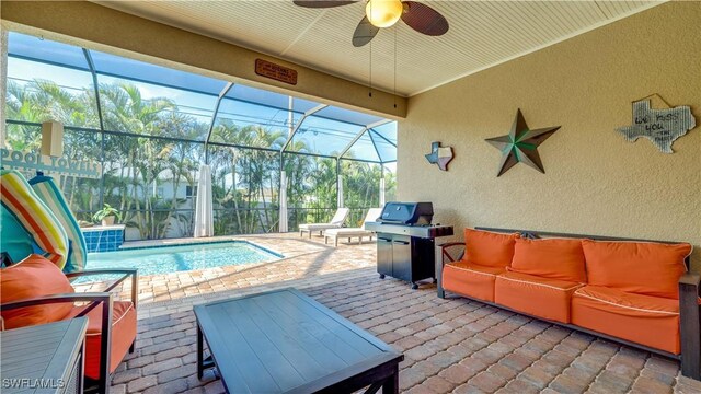 2541 SW 32nd Ln, Cape Coral, FL 33914 - view of patio / terrace with outdoor lounge area, ceiling fan, an outdoor pool, glass enclosure, and a grill