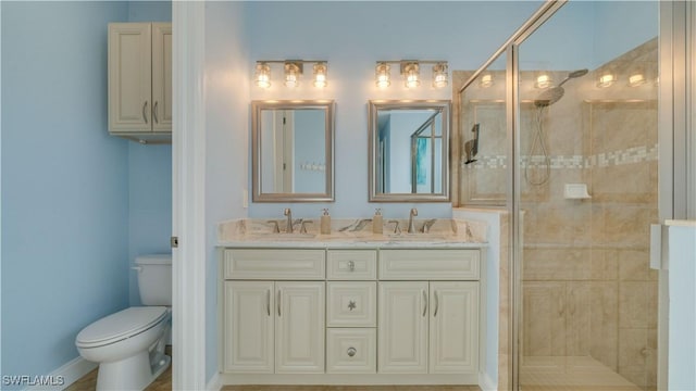 2541 SW 32nd Ln, Cape Coral, FL 33914 - bathroom with a shower stall, toilet, and double vanity