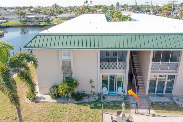 3905 Del Prado Blvd S Unit D-101, Cape Coral, FL 33904 - view of property featuring a water view