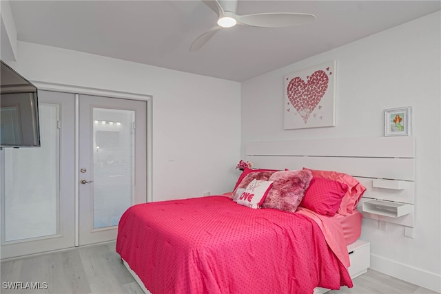 3905 Del Prado Blvd S Unit D-101, Cape Coral, FL 33904 - bedroom with wood finished floors, baseboards, and ceiling fan