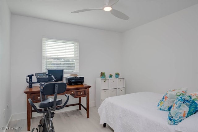 3905 Del Prado Blvd S Unit D-101, Cape Coral, FL 33904 - bedroom featuring a desk, a ceiling fan, and wood finished floors
